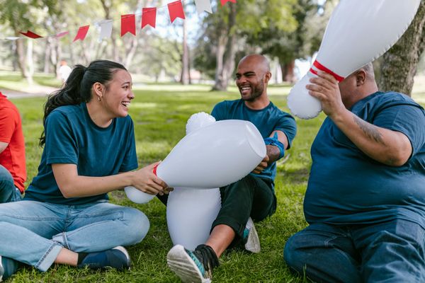 Diverse group of people smiling after a wellness activity.